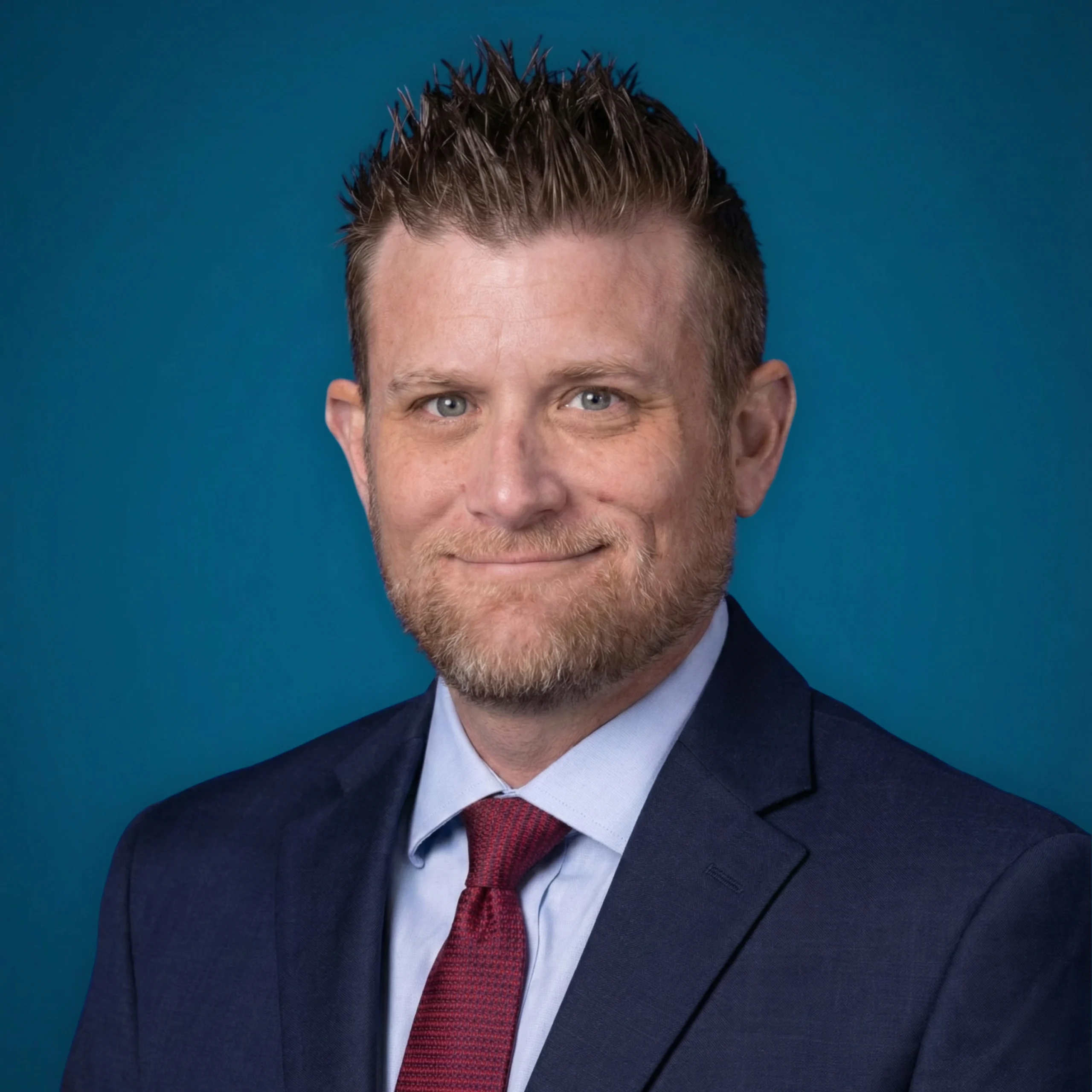 Professional headshot of Brett Norvig, personal injury attorney at Dennis Hernandez Injury Attorneys.