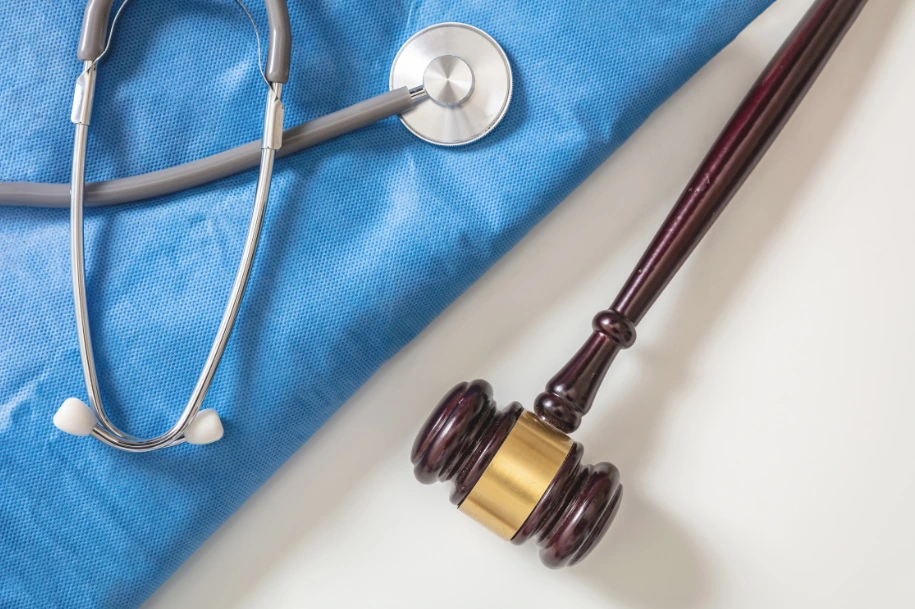 Gavel and stethoscope symbolizing medical malpractice and personal injury law at Dennis Hernandez Injury Attorneys.