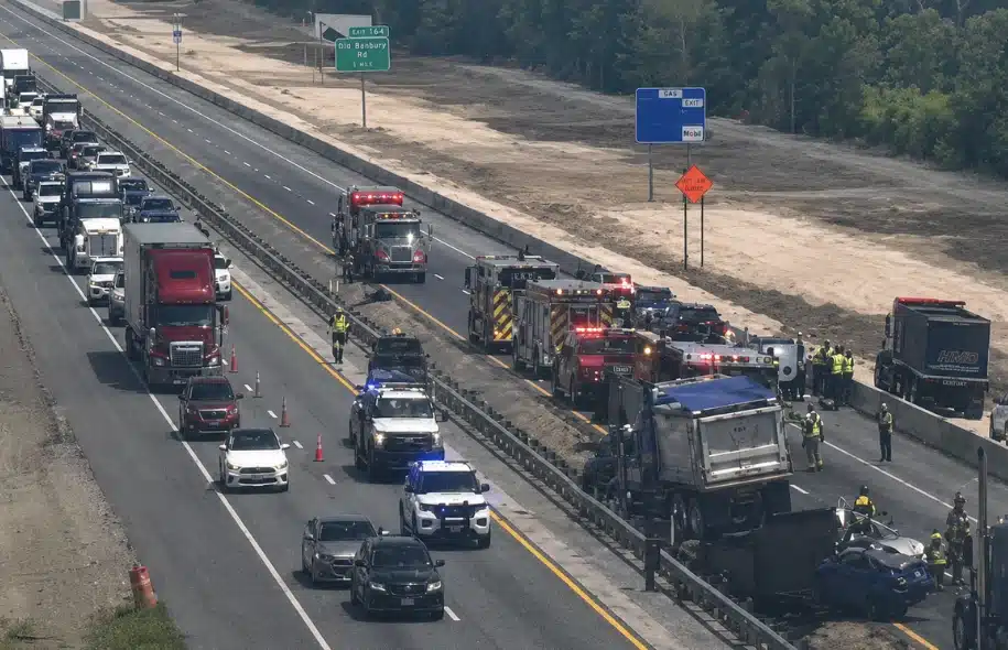 Emergency responders managing a major multi-vehicle crash on a highway in Osceola County.
