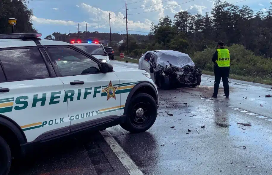 Polk County Sheriff's deputies investigating a severe motor vehicle crash in Davenport involving a heavily damaged passenger vehicle.