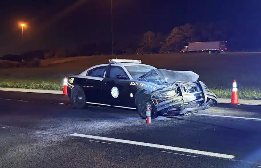 Damaged Florida Highway Patrol cruiser on Interstate 4 after a nighttime crash during a police pursuit in Polk County.